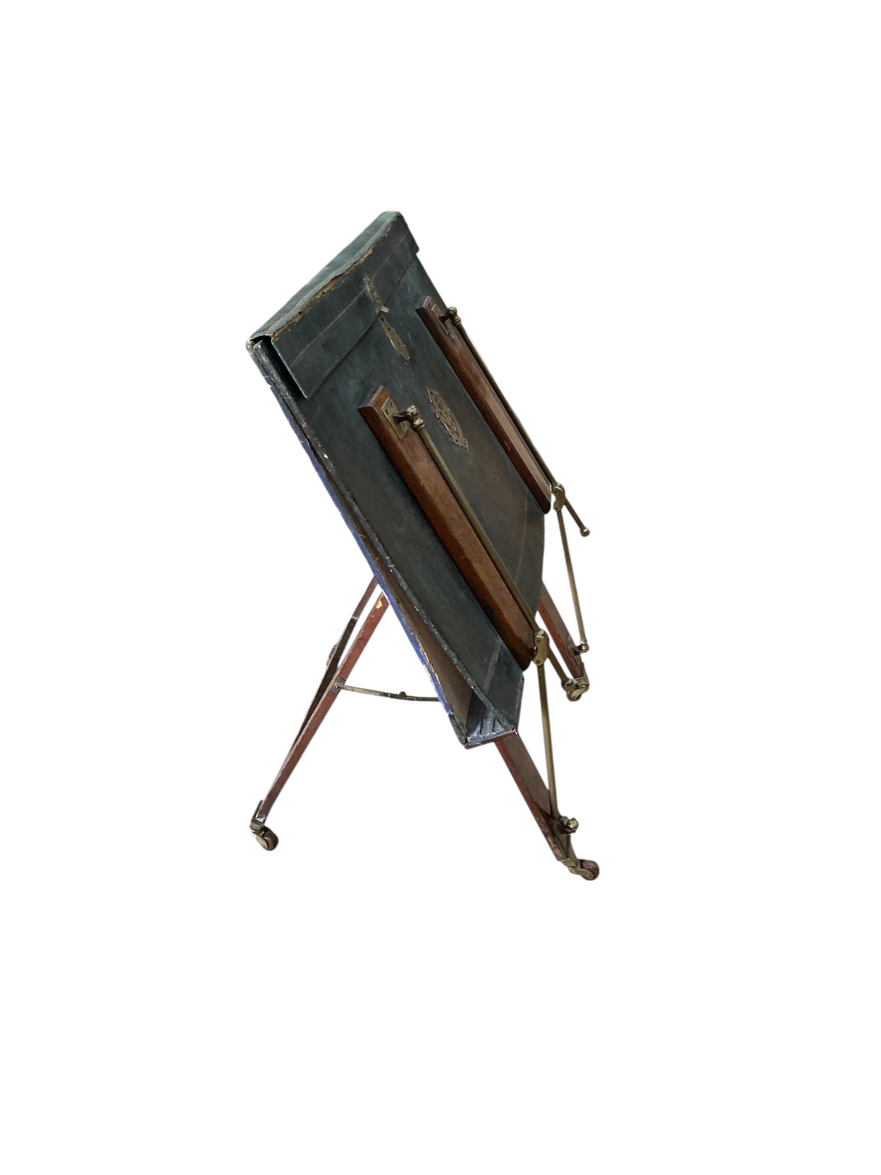 A Victorian brass mounted green morocco folio stand, width 82cm, height 90cm